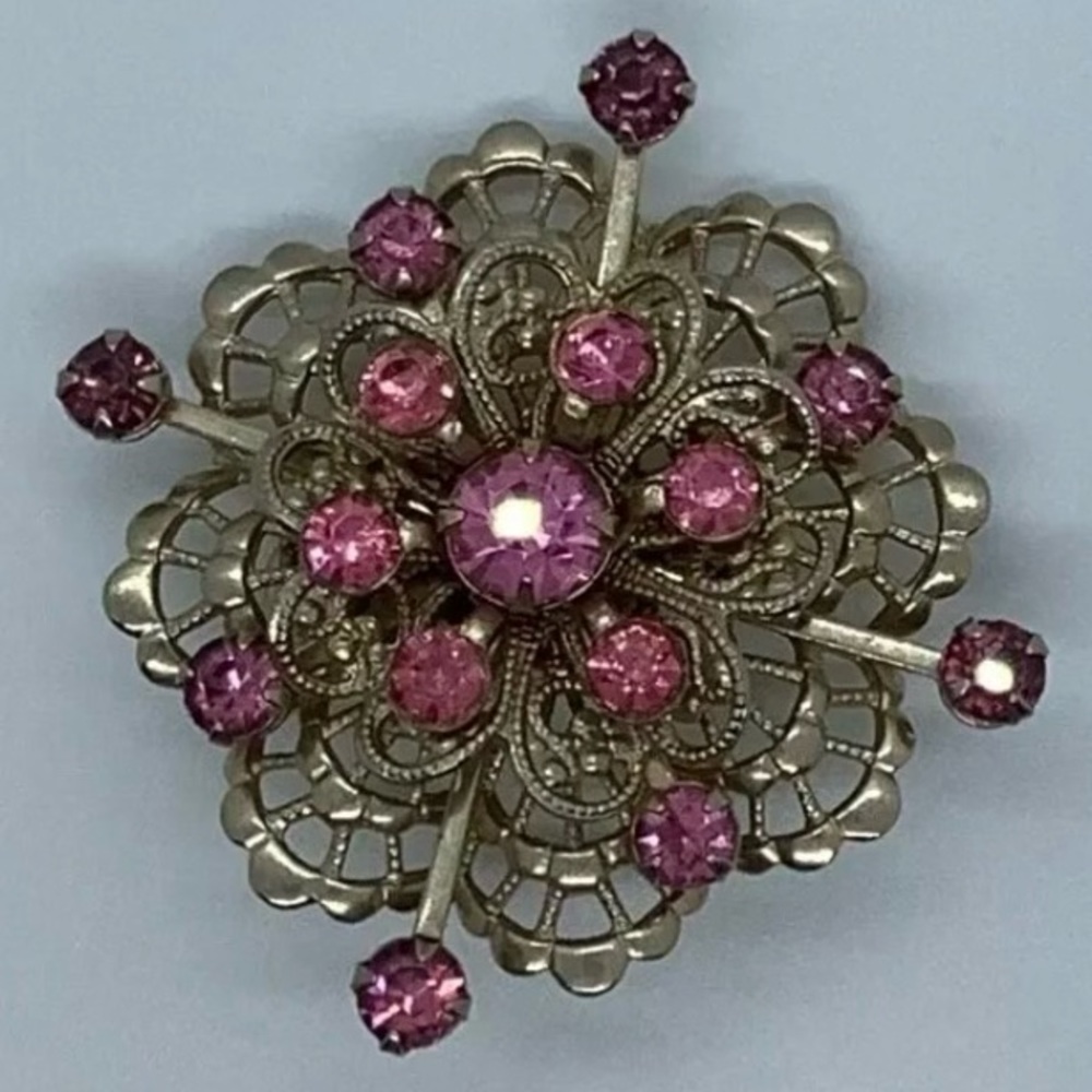 Yellow Gold Tone Brooch With Pink Stones